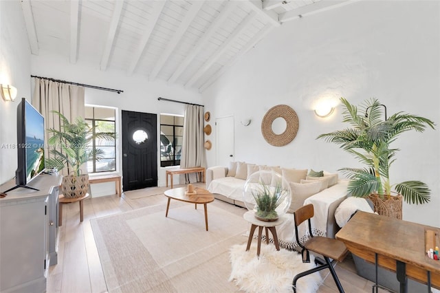 1339 14th Ter, Miami Beach, FL 33139 - living area with light wood-style flooring, beamed ceiling, and high vaulted ceiling