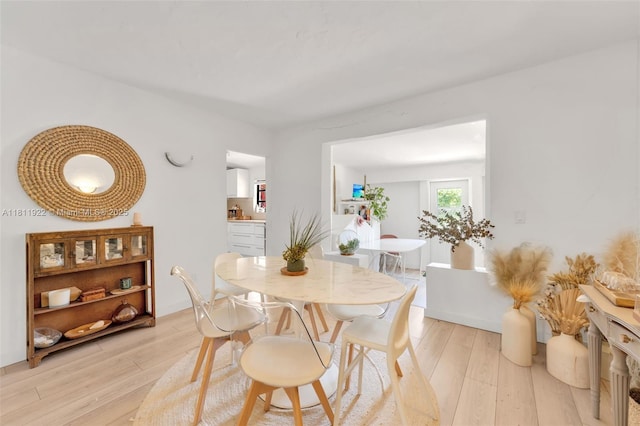 1339 14th Ter, Miami Beach, FL 33139 - dining space featuring light wood-style flooring