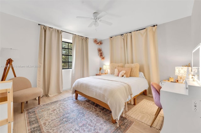1339 14th Ter, Miami Beach, FL 33139 - bedroom featuring light wood-style flooring and a ceiling fan