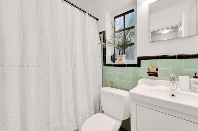 1339 14th Ter, Miami Beach, FL 33139 - bathroom with vanity, tile walls, and a shower with shower curtain