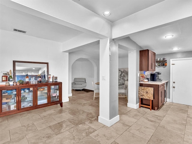 17320 SW 117th Ave, Miami, FL 33177 - kitchen featuring light countertops, arched walkways, and recessed lighting