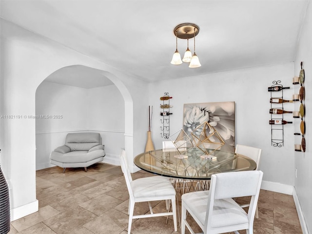 17320 SW 117th Ave, Miami, FL 33177 - dining area featuring arched walkways and baseboards