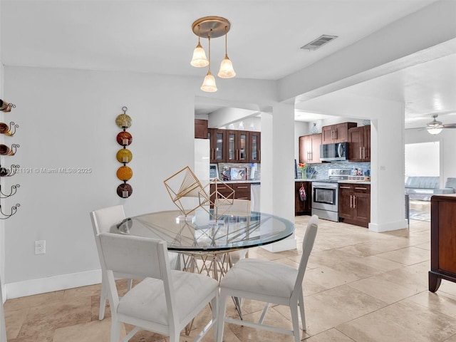 17320 SW 117th Ave, Miami, FL 33177 - dining space with ceiling fan and light tile patterned flooring