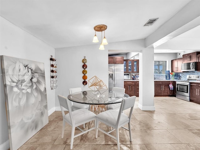 17320 SW 117th Ave, Miami, FL 33177 - dining room with baseboards