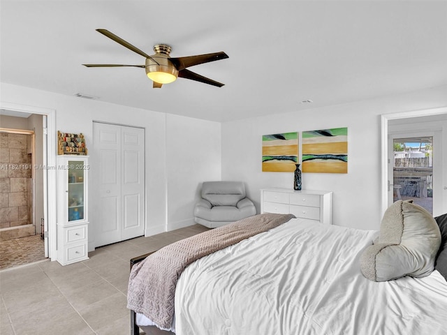 17320 SW 117th Ave, Miami, FL 33177 - bedroom featuring light tile patterned floors, a ceiling fan, and connected bathroom