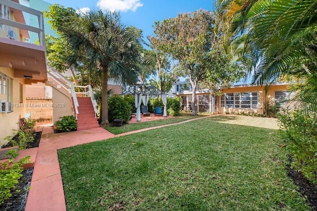 101 Lucerne Ave, Lake Worth, FL 33460 - view of grassy yard featuring stairway