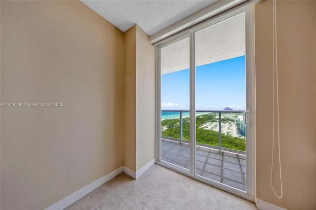 100 Bayview Dr Unit 1922, Sunny Isles Beach, FL 33160 - empty room with light carpet and baseboards