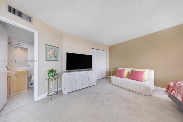 100 Bayview Dr Unit 1922, Sunny Isles Beach, FL 33160 - living area featuring light carpet and baseboards