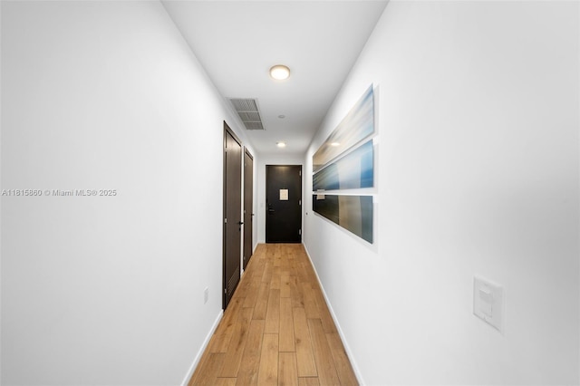 398 NE 5th St Unit 1809, Miami, FL 33132 - corridor featuring light wood-style floors and recessed lighting