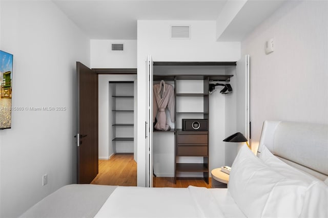 398 NE 5th St Unit 1809, Miami, FL 33132 - bedroom with wood finished floors
