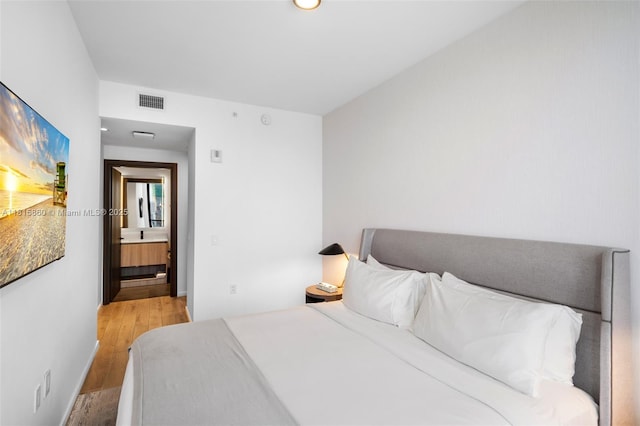398 NE 5th St Unit 1809, Miami, FL 33132 - bedroom featuring wood finished floors and recessed lighting