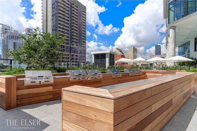 398 NE 5th St Unit 1809, Miami, FL 33132 - deck with area for grilling and a view of city