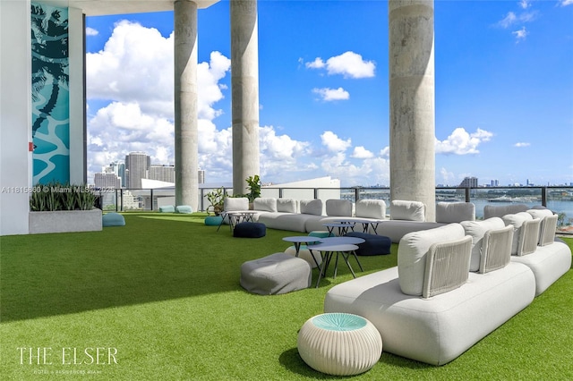 398 NE 5th St Unit 1809, Miami, FL 33132 - view of community with outdoor lounge area, a view of city, and a water view