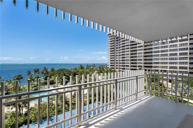 3 Grove Isle Dr Unit C602, Miami, FL 33133 - balcony with a water view and view of pool area