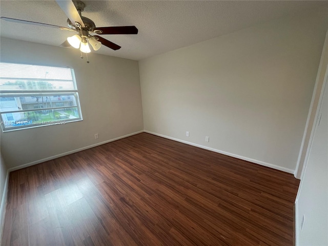 413 Saxony I Unit 413, Delray Beach, FL 33446 - unfurnished room with dark wood-style flooring, ceiling fan, and a textured ceiling