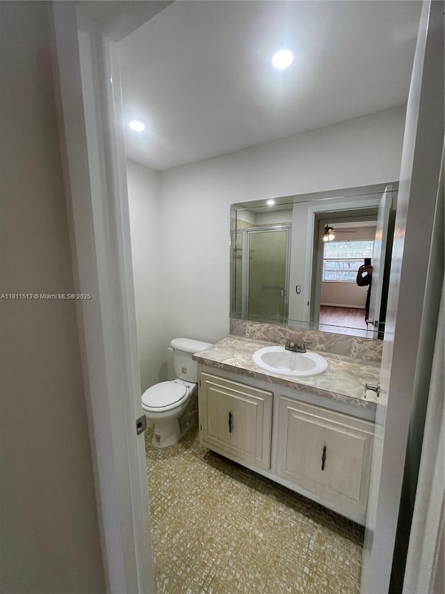 413 Saxony I Unit 413, Delray Beach, FL 33446 - bathroom featuring vanity, a shower stall, and recessed lighting
