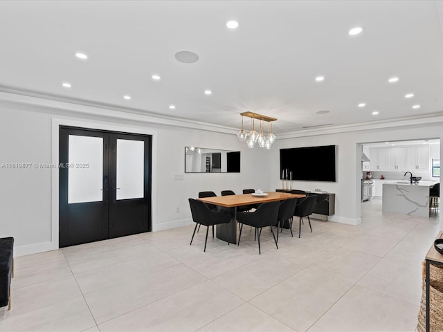 4531 SW 15th St, Miami, FL 33134 - dining space featuring ornamental molding, french doors, light tile patterned flooring, recessed lighting, and a chandelier