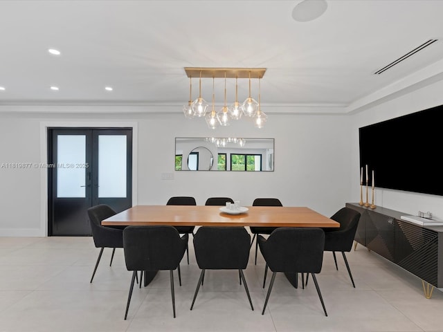 4531 SW 15th St, Miami, FL 33134 - dining space featuring light tile patterned floors, french doors, recessed lighting, ornamental molding, and a chandelier