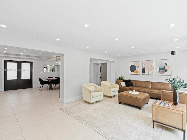 4531 SW 15th St, Miami, FL 33134 - living area with recessed lighting, light tile patterned floors, and french doors