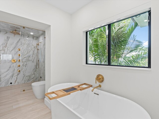 4531 SW 15th St, Miami, FL 33134 - full bath featuring a marble finish shower and a freestanding tub
