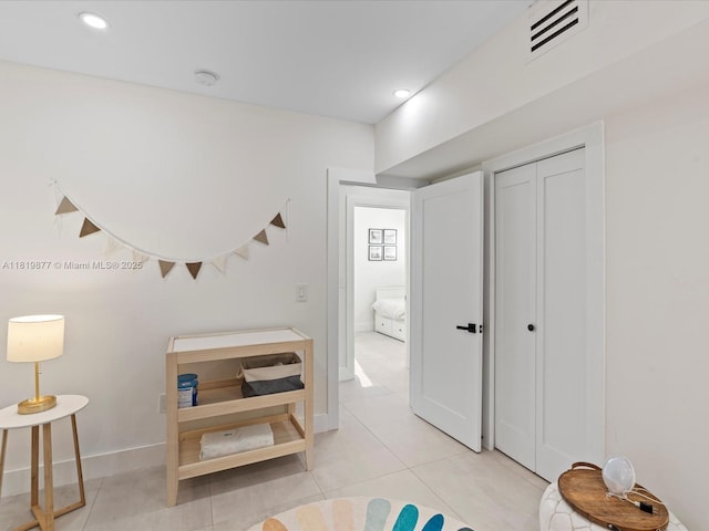 4531 SW 15th St, Miami, FL 33134 - bedroom featuring light tile patterned floors, recessed lighting, and a closet