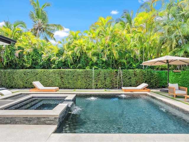 4531 SW 15th St, Miami, FL 33134 - view of pool featuring an in-ground hot tub and a fenced backyard