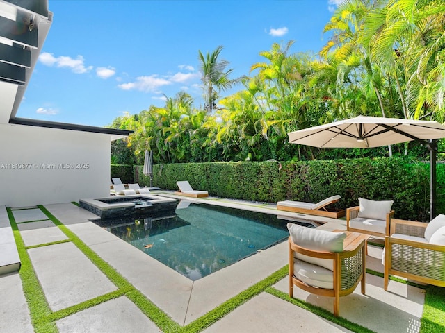 4531 SW 15th St, Miami, FL 33134 - view of swimming pool featuring a patio area, a fenced backyard, and a pool with connected hot tub