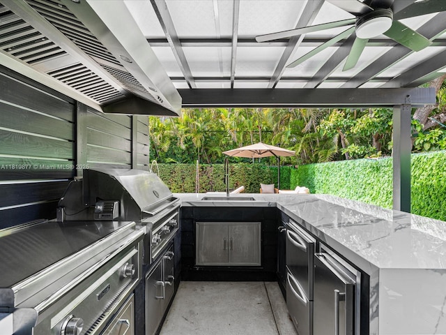 4531 SW 15th St, Miami, FL 33134 - view of patio / terrace featuring a ceiling fan and exterior kitchen