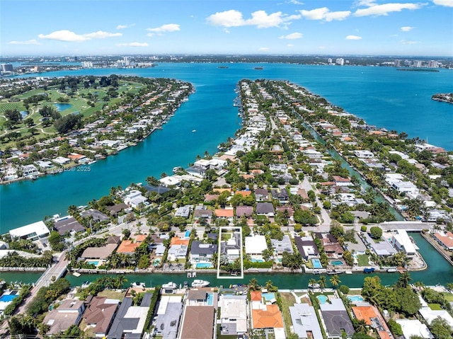 7755 Noremac Ave, Miami Beach, FL 33141 - aerial overview of property's location with a large body of water and nearby suburban area