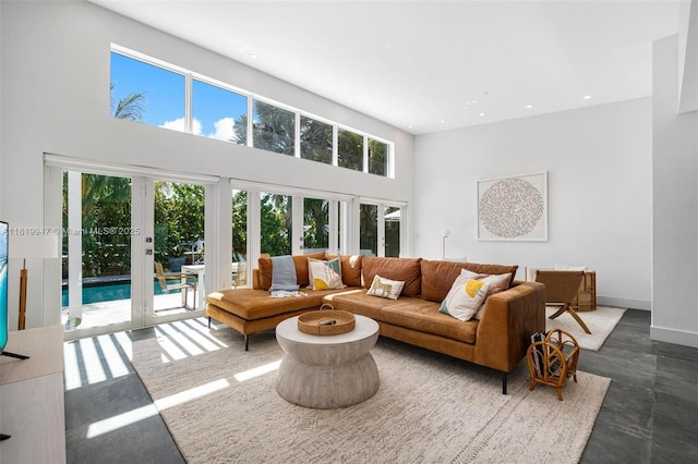 7755 Noremac Ave, Miami Beach, FL 33141 - living area with a high ceiling, french doors, and recessed lighting