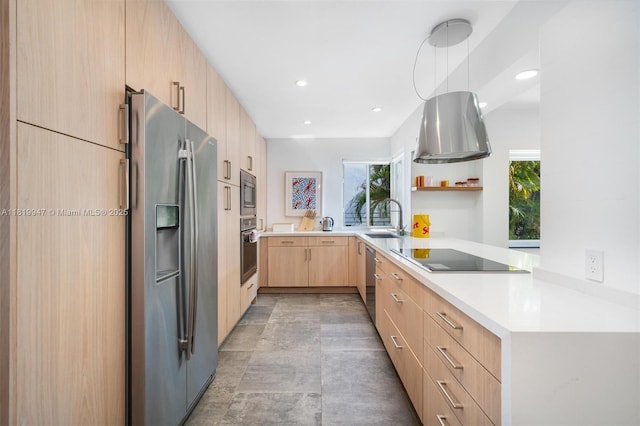 7755 Noremac Ave, Miami Beach, FL 33141 - kitchen featuring light brown cabinetry, appliances with stainless steel finishes, modern cabinets, light countertops, and recessed lighting