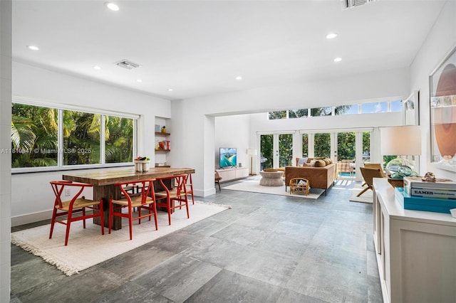 7755 Noremac Ave, Miami Beach, FL 33141 - dining area featuring recessed lighting and french doors