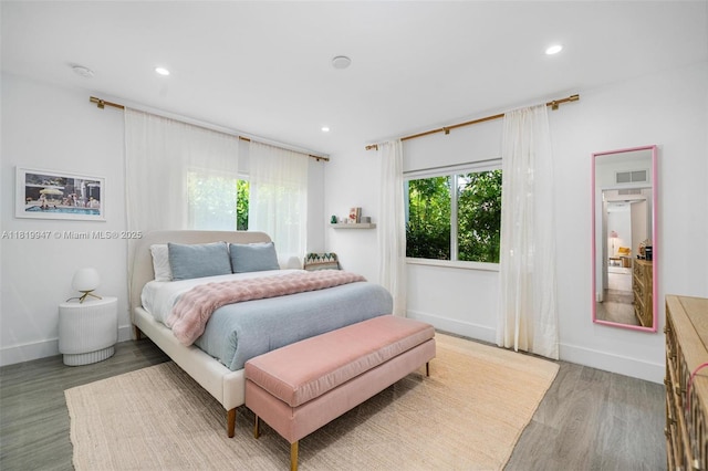 7755 Noremac Ave, Miami Beach, FL 33141 - bedroom featuring wood finished floors and recessed lighting