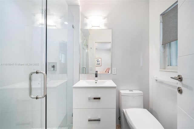 7755 Noremac Ave, Miami Beach, FL 33141 - full bath featuring a stall shower, tile walls, and vanity