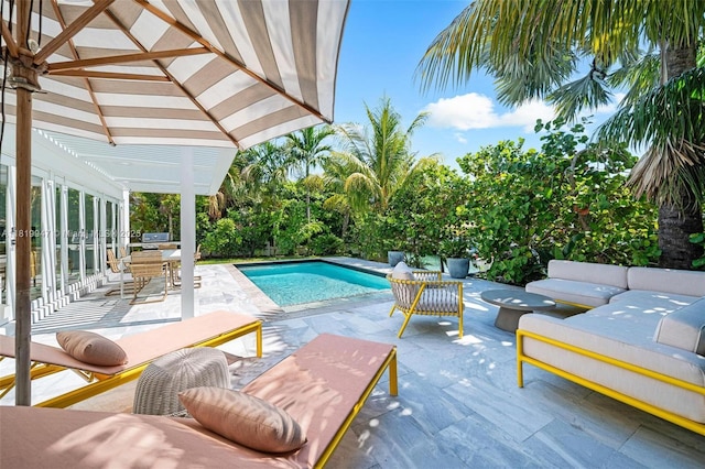 7755 Noremac Ave, Miami Beach, FL 33141 - swimming pool featuring an outdoor hangout area and a patio