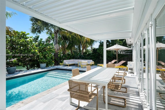 7755 Noremac Ave, Miami Beach, FL 33141 - outdoor pool featuring a patio and an outdoor hangout area