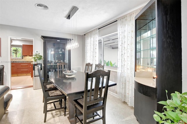 6285 Pine Ter, Plantation, FL 33317 - dining area with baseboards