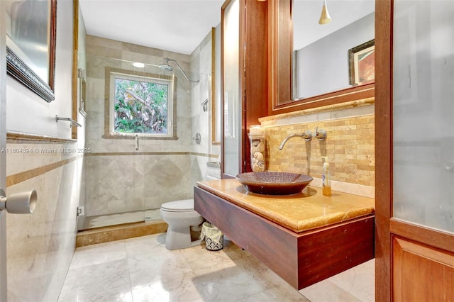 6285 Pine Ter, Plantation, FL 33317 - full bath with a shower stall, marble finish flooring, vanity, and tile walls