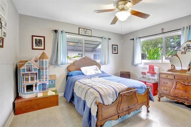 6285 Pine Ter, Plantation, FL 33317 - carpeted bedroom featuring multiple windows and a ceiling fan