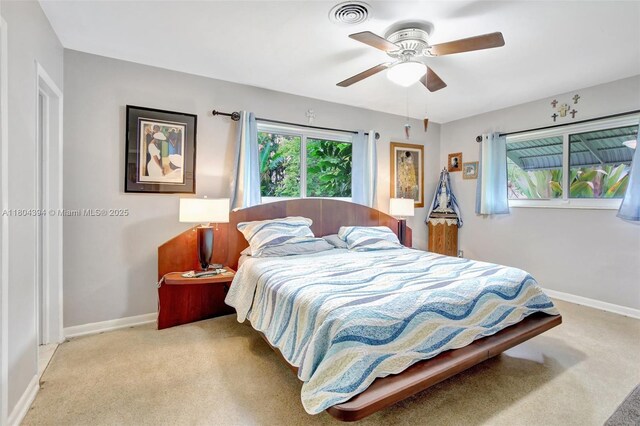 6285 Pine Ter, Plantation, FL 33317 - bedroom with light colored carpet and ceiling fan