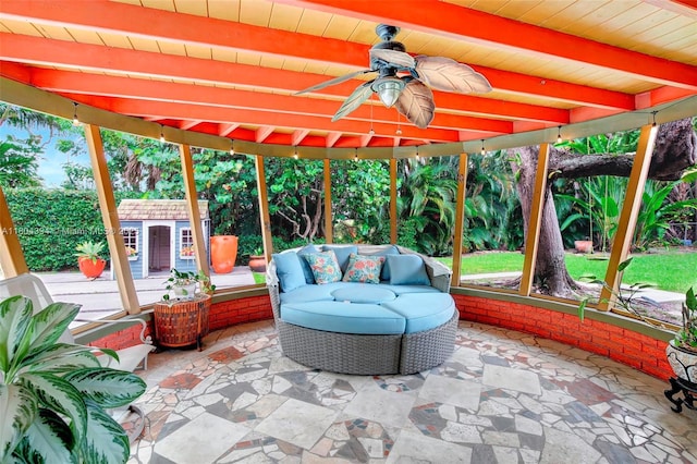 6285 Pine Ter, Plantation, FL 33317 - fenced backyard featuring a shed, a patio, a ceiling fan, and an outdoor hangout area