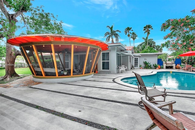 6285 Pine Ter, Plantation, FL 33317 - outdoor pool with a patio area and a sunroom