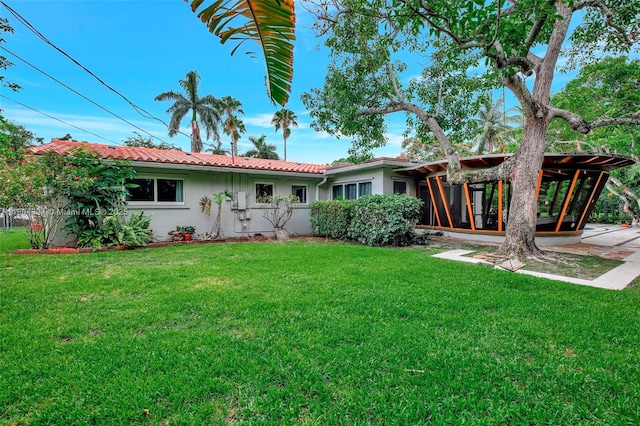 6285 Pine Ter, Plantation, FL 33317 - back of property with stucco siding and a yard