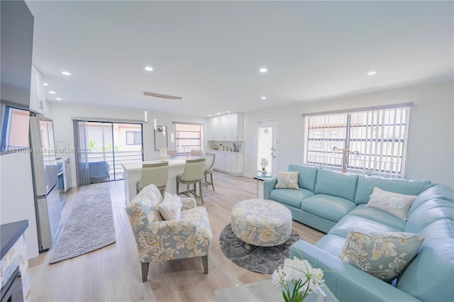 126 Piedmont C 126, Delray Beach, FL 33484 - living area featuring light wood-type flooring and recessed lighting
