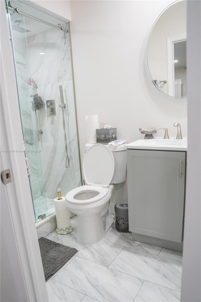 126 Piedmont C 126, Delray Beach, FL 33484 - full bathroom featuring a marble finish shower, vanity, and marble finish flooring