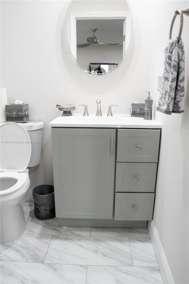 126 Piedmont C 126, Delray Beach, FL 33484 - half bath featuring vanity and marble look tiles