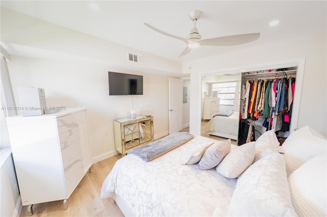 126 Piedmont C 126, Delray Beach, FL 33484 - bedroom featuring a closet, light wood-style flooring, electric panel, and a ceiling fan