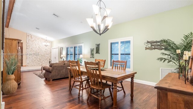 10123 Vestal Ct, Coral Springs, FL 33071 - dining area with a chandelier, dark wood-type flooring, and lofted ceiling