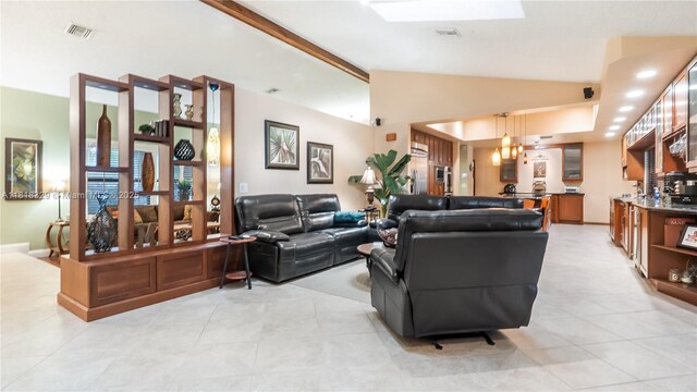 10123 Vestal Ct, Coral Springs, FL 33071 - living area with light tile patterned flooring and lofted ceiling