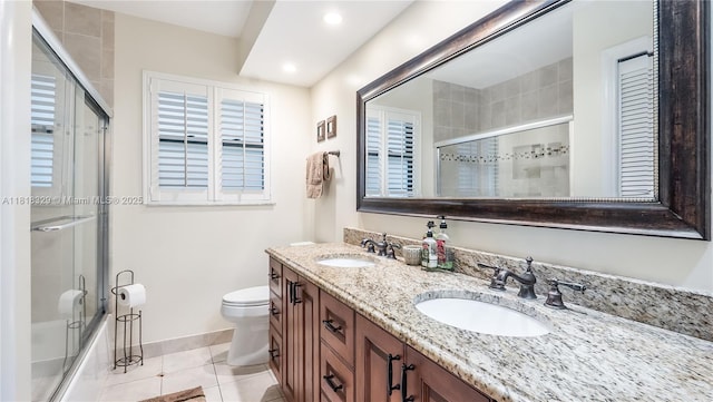 10123 Vestal Ct, Coral Springs, FL 33071 - full bathroom featuring double vanity, tile patterned flooring, enclosed tub / shower combo, and recessed lighting